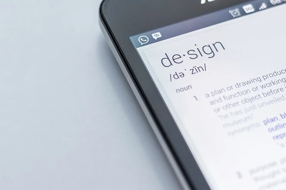 A smartphone displaying the dictionary definition of design.